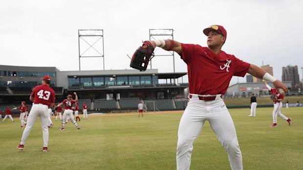 Alabama's Ian Petrutz warms up at Regions Field on Feb. 27.